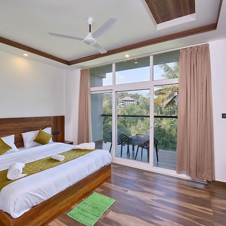 Velvet Revive Munnar Hotel Bagian luar foto